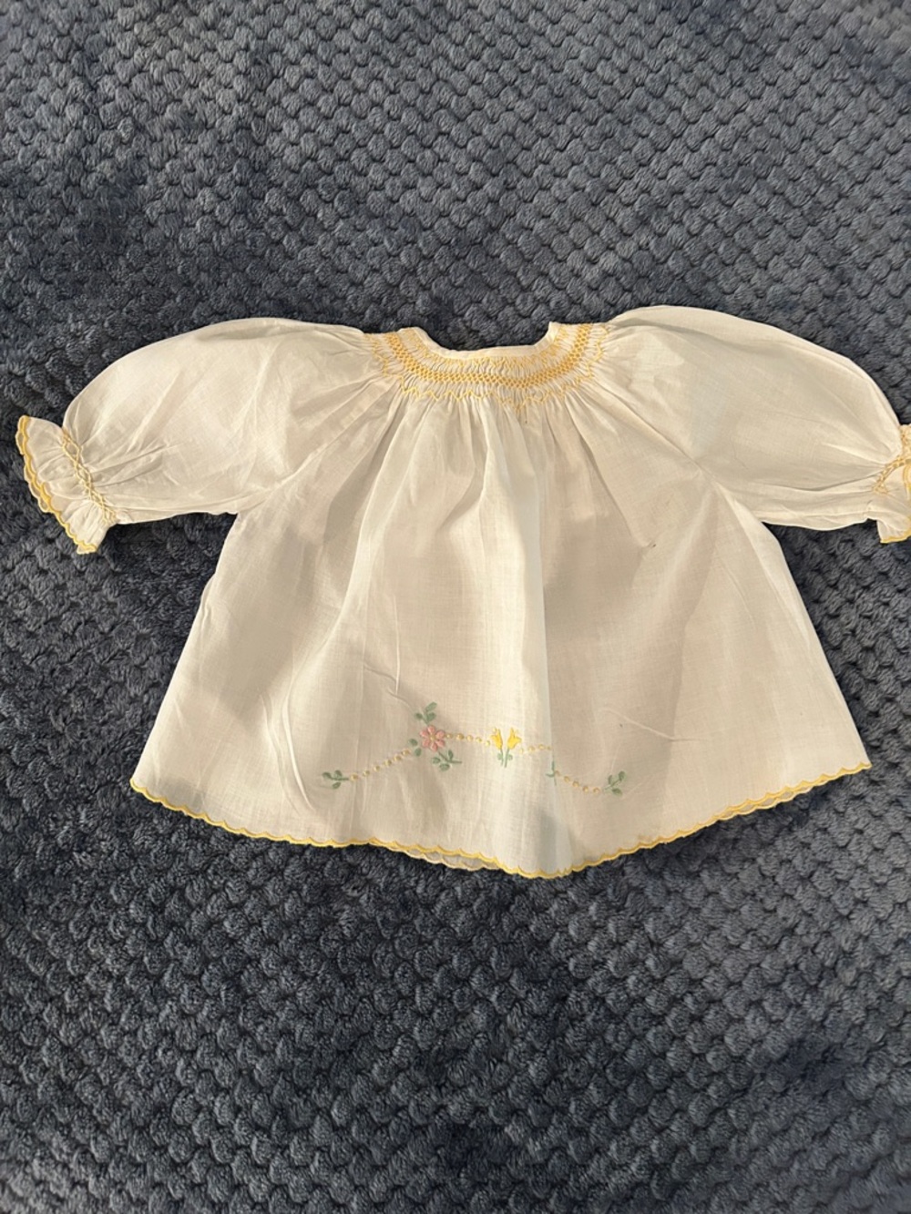 Italian  embroidered and smocked dress for infant from the ‘80s .